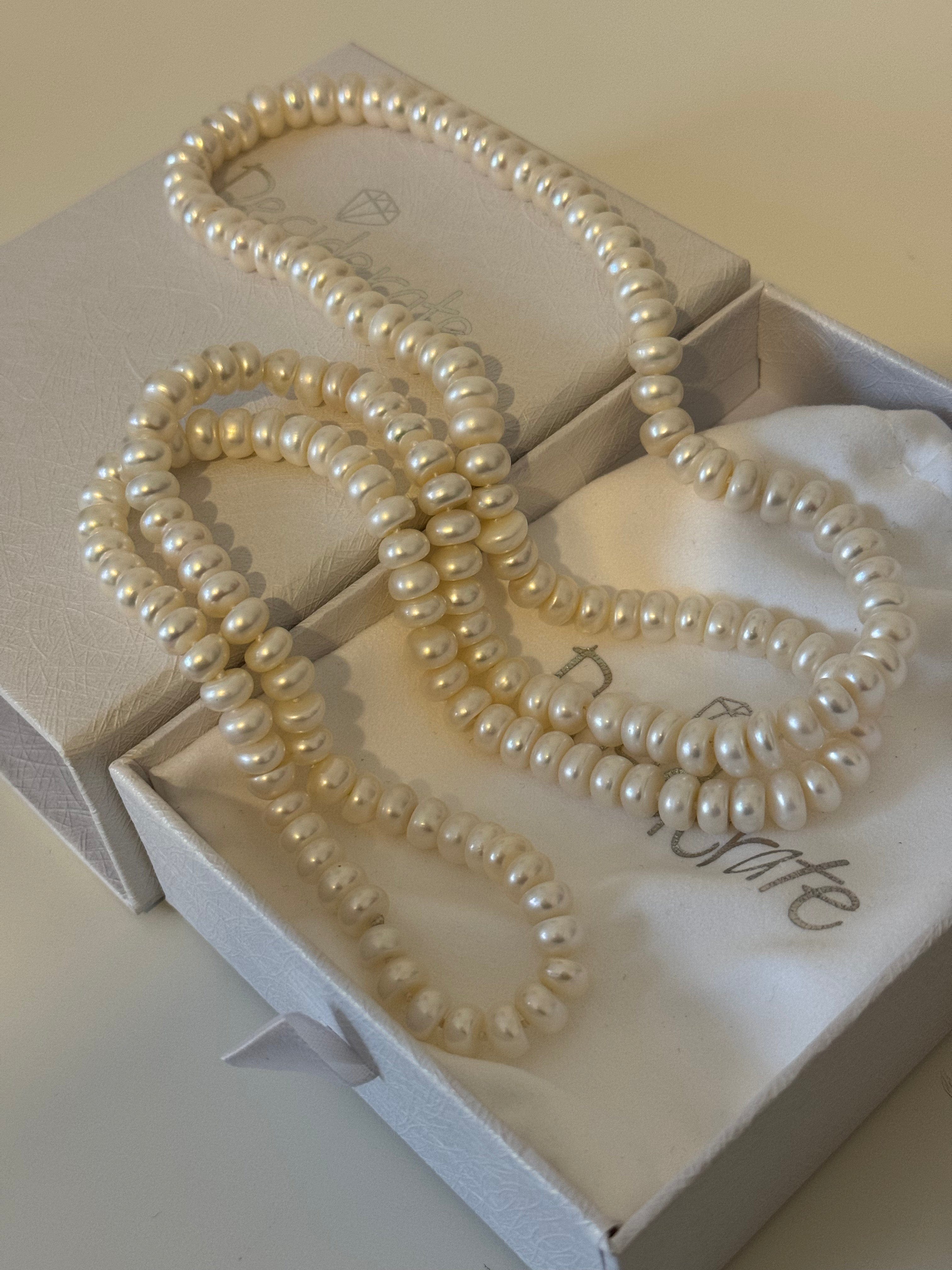 Long chain store pearl necklace