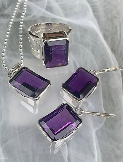 Stunning deep purple amethyst jewellery showcasing vibrant colour, set in sterling silver. February birthstone elegantly displayed.